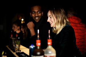 laughing bar guests